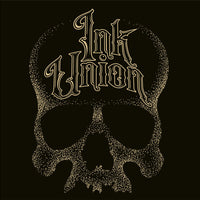 A black background with a gold dot work human skull and the words Ink Union in fancy gold and black lettering across the forehead of the skull.