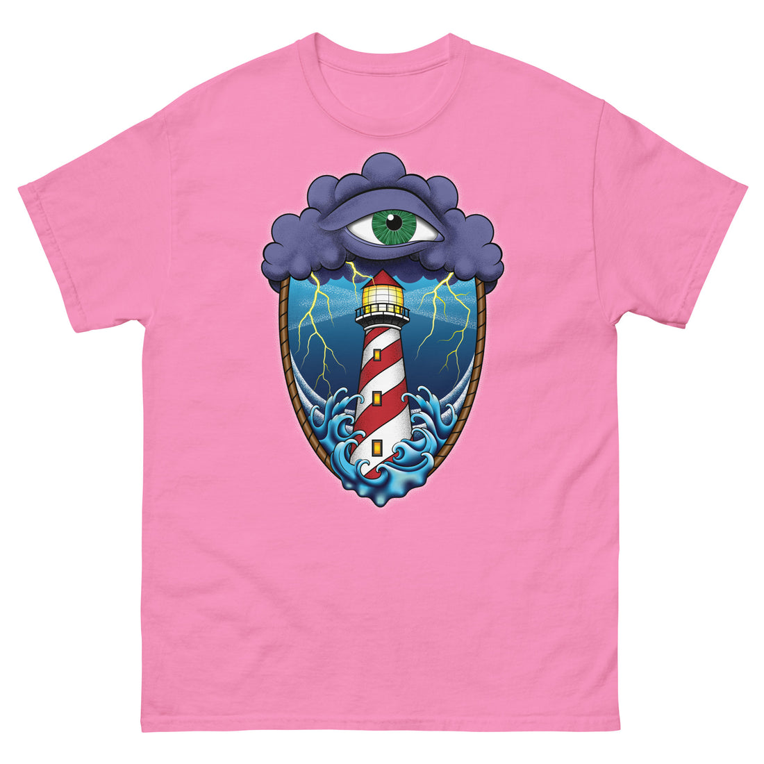 A pink t-shirt with an old school eye of the storm tattoo design of large dark purple storm clouds at the top of the design with a green eye in the middle of the clouds.  Below the clouds is an oval shape with brown rope. Inside the rope are stormy seas and a lighthouse with lightning striking in the background.  At the bottom of the design, some of the waves are spilling out of the rope barrier. The sky and seas are hues of blue; the lighthouse is white and red striped like a barber pole.