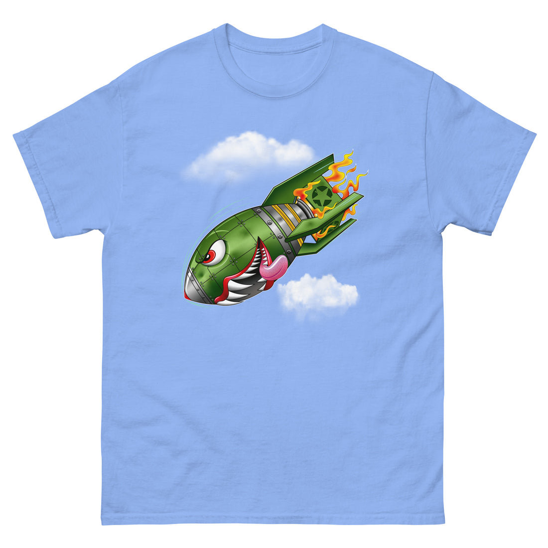 A periwinkle blue t-shirt with a military green neo-traditional bomb tattoo design. The bomb is falling with a look of determination in its eyes, an evil toothy grin, and its tongue hanging out of its mouth. Flames are coming from the back of the bomb, and some clouds are in the background.
