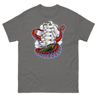 A medium grey t-shirt with an old-school clipper ship tattoo design in green and brown with white sails surrounded by octopus tentacles in shades of red with purple tentacles. Behind the ship are purple-tinged clouds.