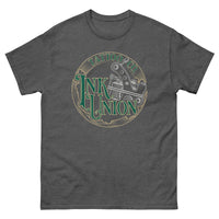 A dark grey t-shirt adorned with the Ink Union Tattoo Co. green and gold with a silver tattoo machine logo.