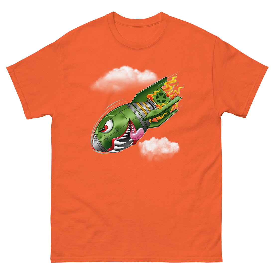 An orange t-shirt with a military green neo-traditional bomb tattoo design. The bomb is falling with a look of determination in its eyes, an evil toothy grin, and its tongue hanging out of its mouth. Flames are coming from the back of the bomb, and some clouds are in the background.
