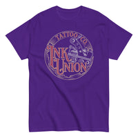 A purple t-shirt adorned with the Ink Union Tattoo Co. red and gold with a silver tattoo machine logo.