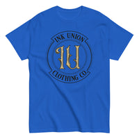 A  royal blue t-shirt with the Ink Union Clothing Co Badge logo in black and gold centered on the front of the shirt.