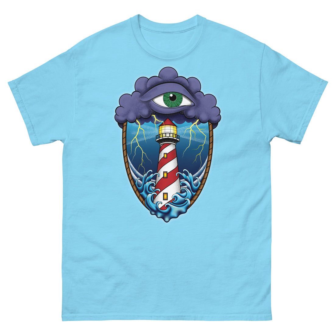 A sky blue t-shirt with an old school eye of the storm tattoo design of large dark purple storm clouds at the top of the design with a green eye in the middle of the clouds.  Below the clouds is an oval shape with brown rope. Inside the rope are stormy seas and a lighthouse with lightning striking in the background.  At the bottom of the design, some of the waves are spilling out of the rope barrier. The sky and seas are hues of blue; the lighthouse is white and red striped like a barber pole.