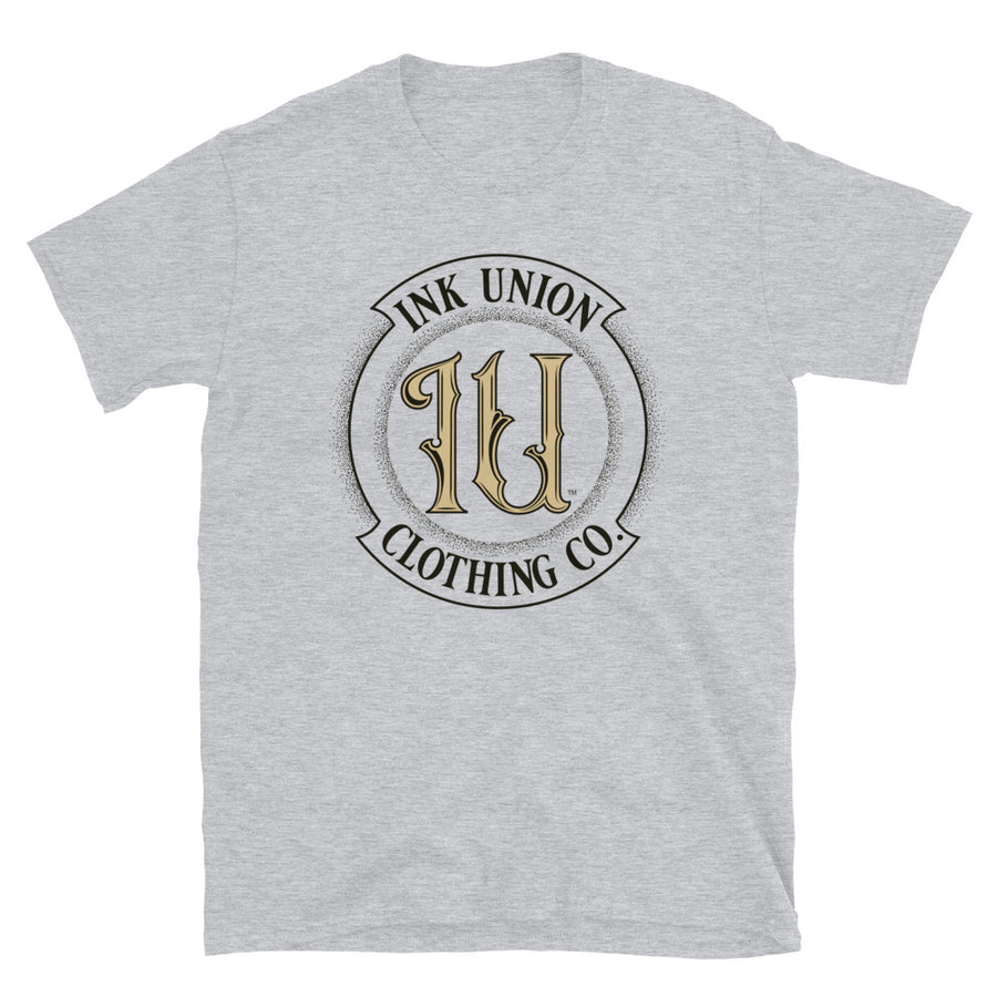 A light grey t-shirt with the Ink Union Clothing Co Badge logo in black and gold centered on the front of the shirt.