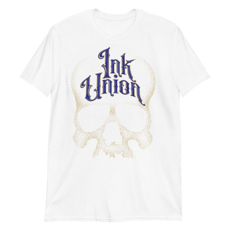 A white t-shirt adorned with a gold dot work human skull  and the words Ink Union in fancy gold and blue lettering across the forehead of the skull.