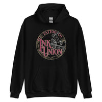 A black hoodie adorned with the Ink Union Tattoo Co. red and gold with a silver tattoo machine logo.