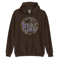 A dark brown hoodie adorned with the Ink Union Tattoo Co. blue and gold with a silver tattoo machine logo