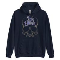 A navy blue hoodie adorned with a gold dot work human skull and the words Ink Union in fancy gold and blue lettering across the forehead of the skull.