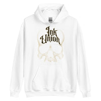 A white hoodie adorned with a gold dot work human skull and the words Ink Union in fancy gold and black lettering across the forehead of the skull.