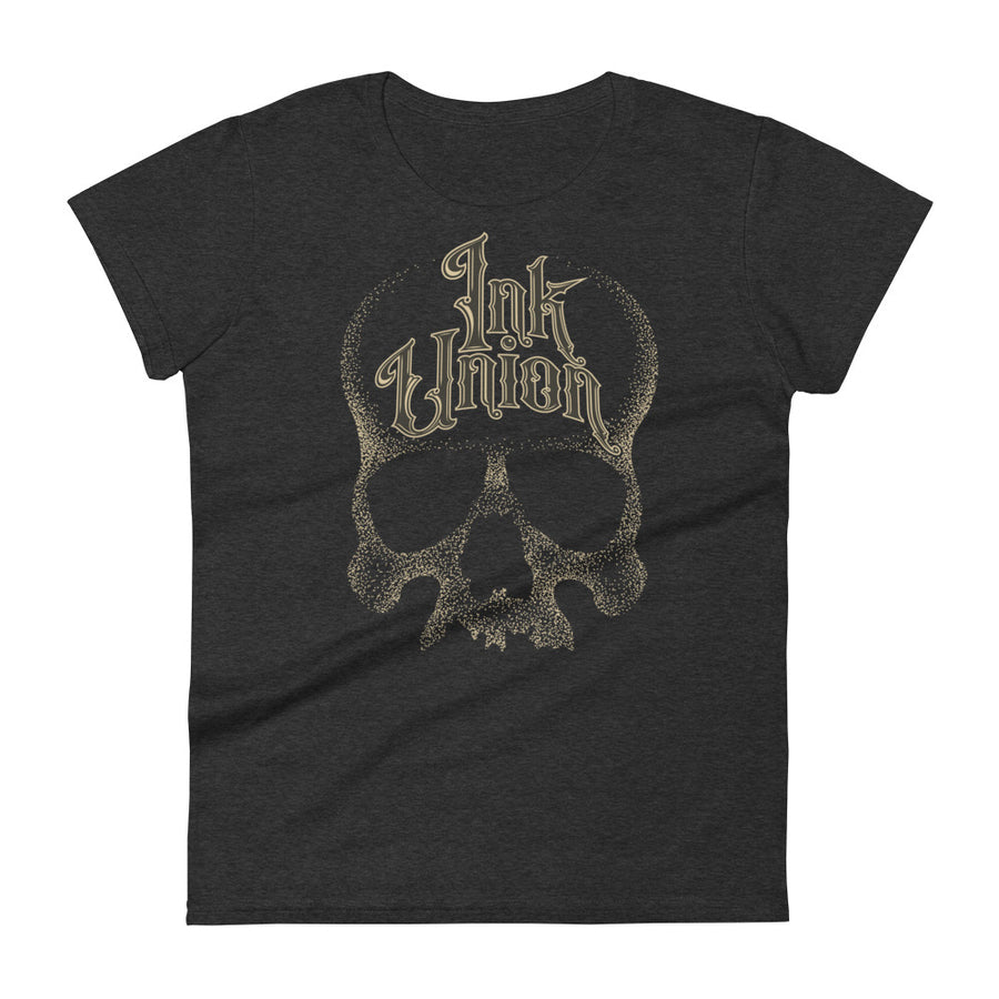 A dark grey t-shirt with a gold dot work human skull and the words Ink Union in fancy gold and black lettering across the forehead of the skull.