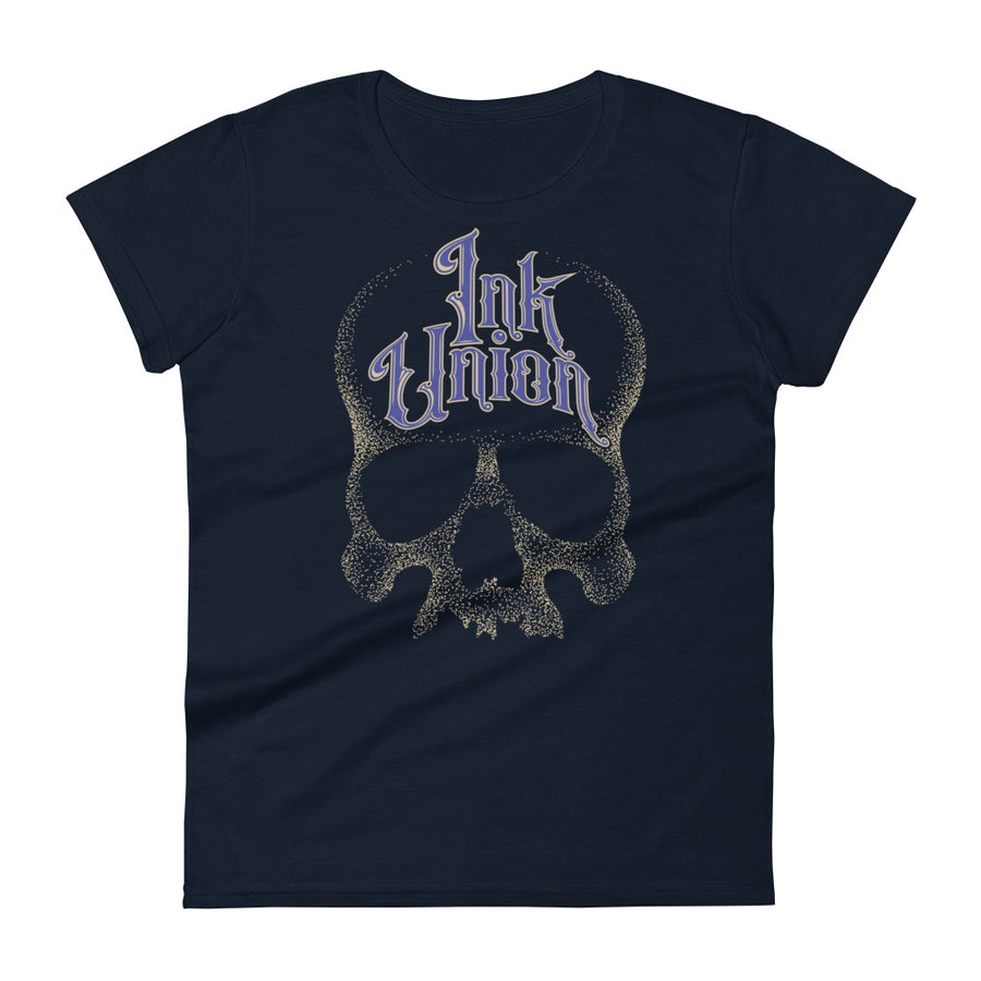 A Navy t-shirt background with a gold dot work human skull and the words Ink Union in fancy gold and blue lettering across the forehead of the skull.