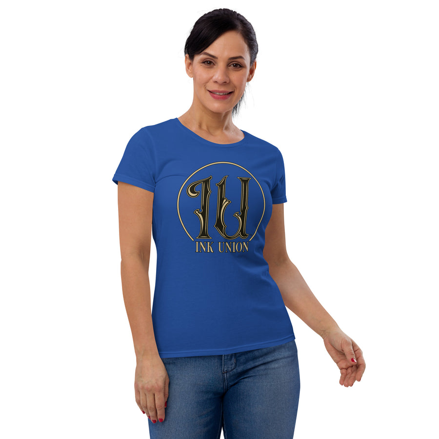 An attractive woman wearing an Ink Union Clothing Co. royal blue t-shirt featuring the Ink Union ring logo in black and gold.