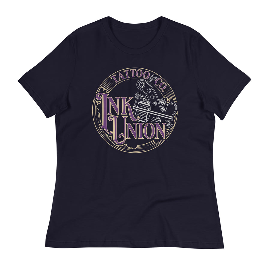 A navy-blue t-shirt adorned with the Ink Union Tattoo Co. purple and gold with a silver tattoo machine logo.