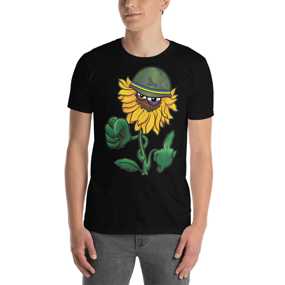 man wearing an Ink Union Clothing Co. black unisex t-shirt with a  Sunflower with a scowling face and army helmet with the Ukrainian flag colors on the band.  The leaves on one side are curled into a fist the leaves on the other side are flipping the bird